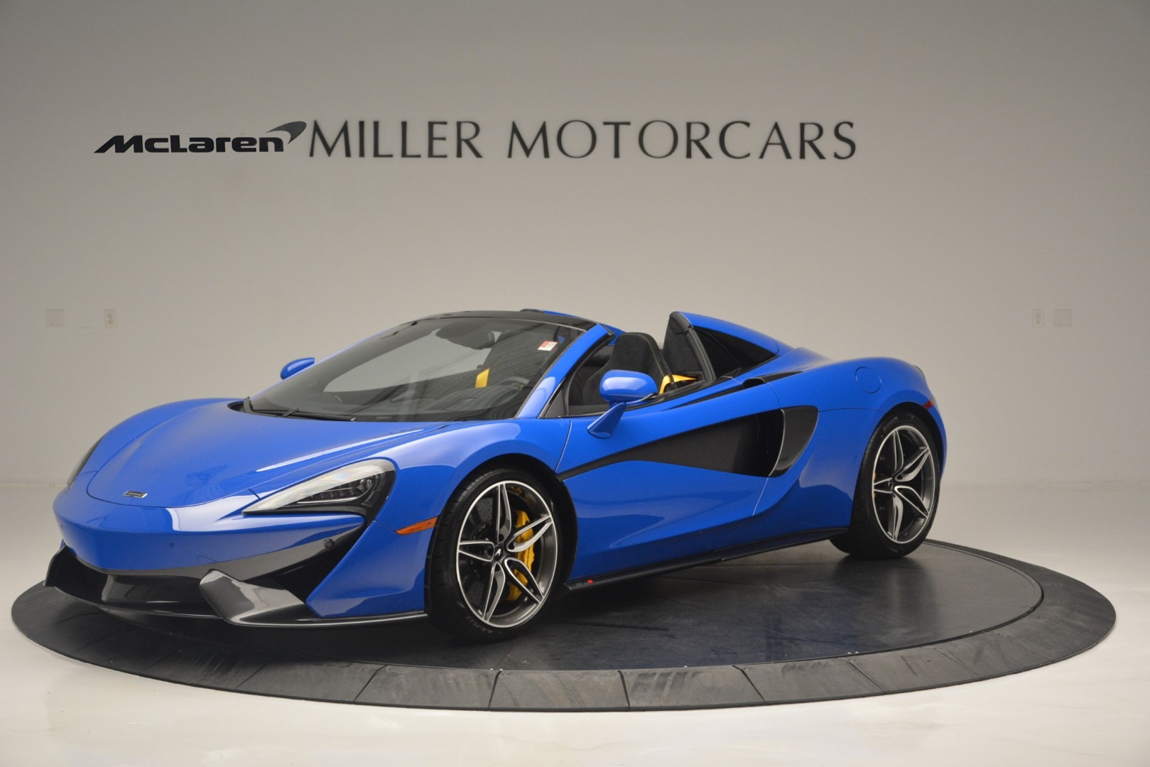 Макларен 570s голубой
